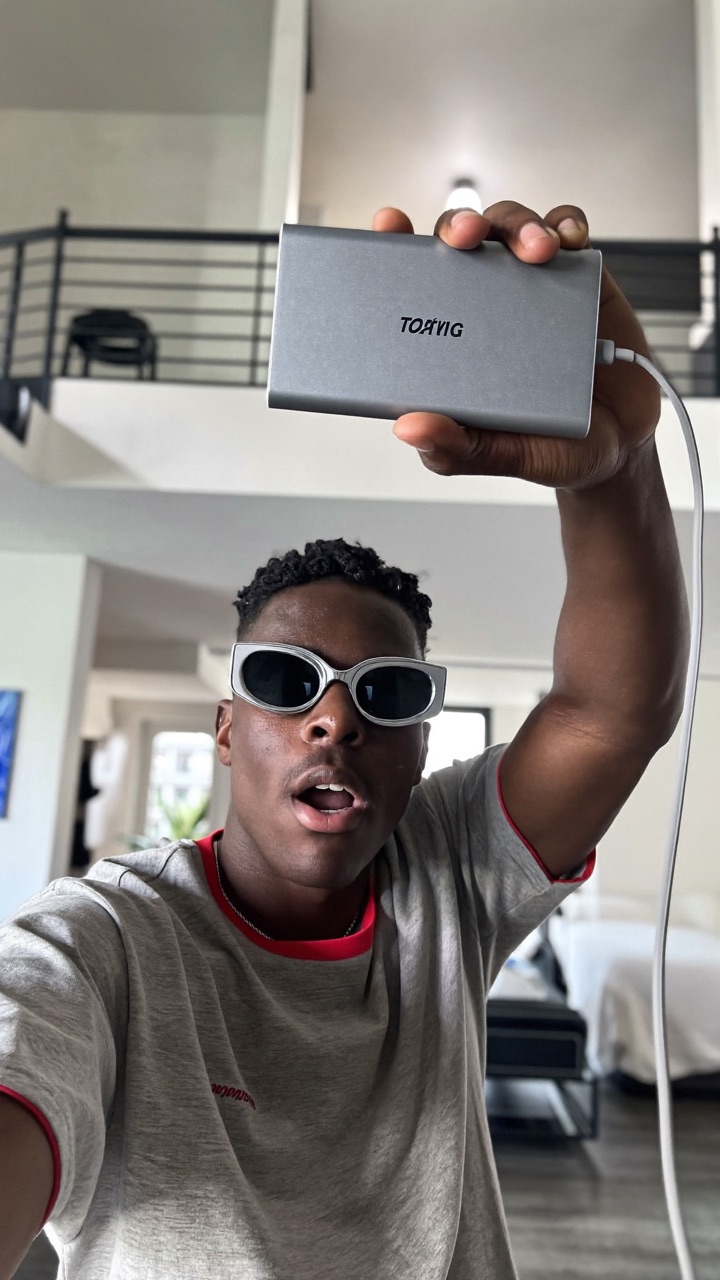 UGC creator showing a phone charger in a TikTok review